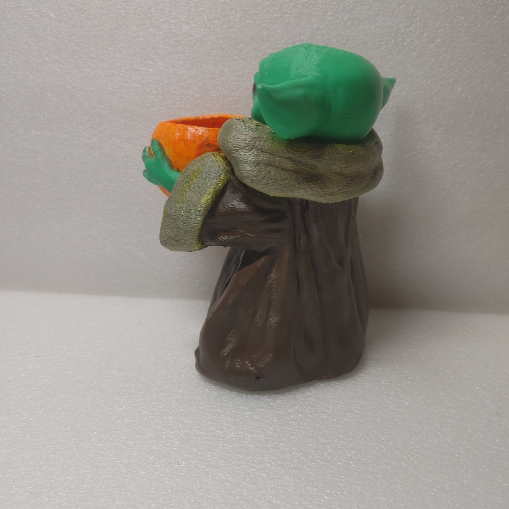 Green Baby Yoda Figurine Holding Orange Pumpkin - Picture 4 of 9